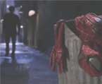 Peter throws out the Spiderman costume